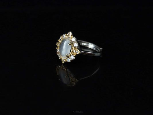 A moonlit oval flower jadeite ring.