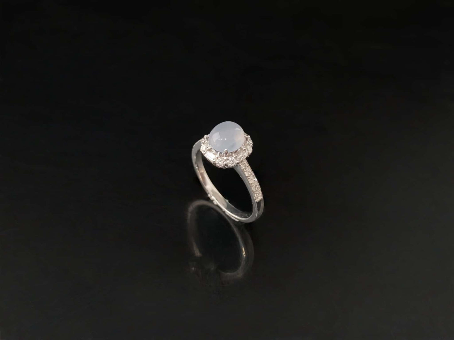 A pale dew drop jadeite ring.