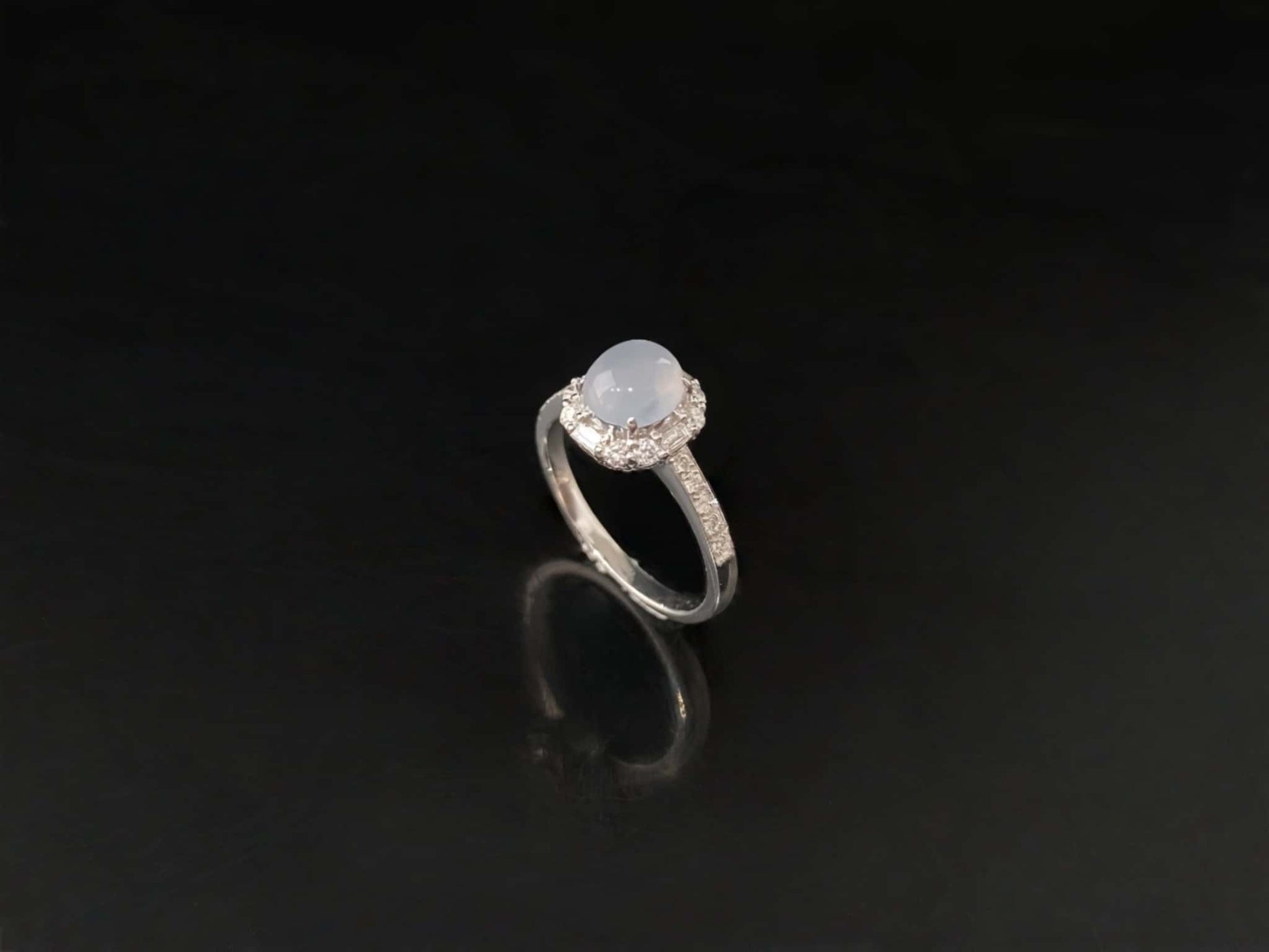 A pale dew drop jadeite ring.