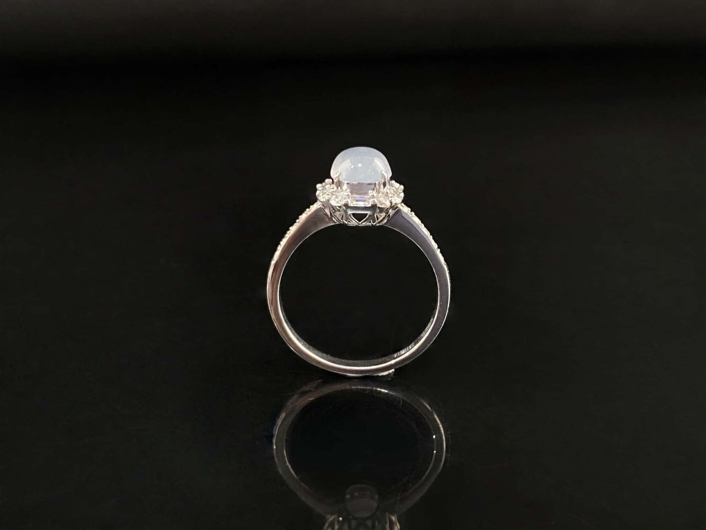 A pale dew drop jadeite ring.