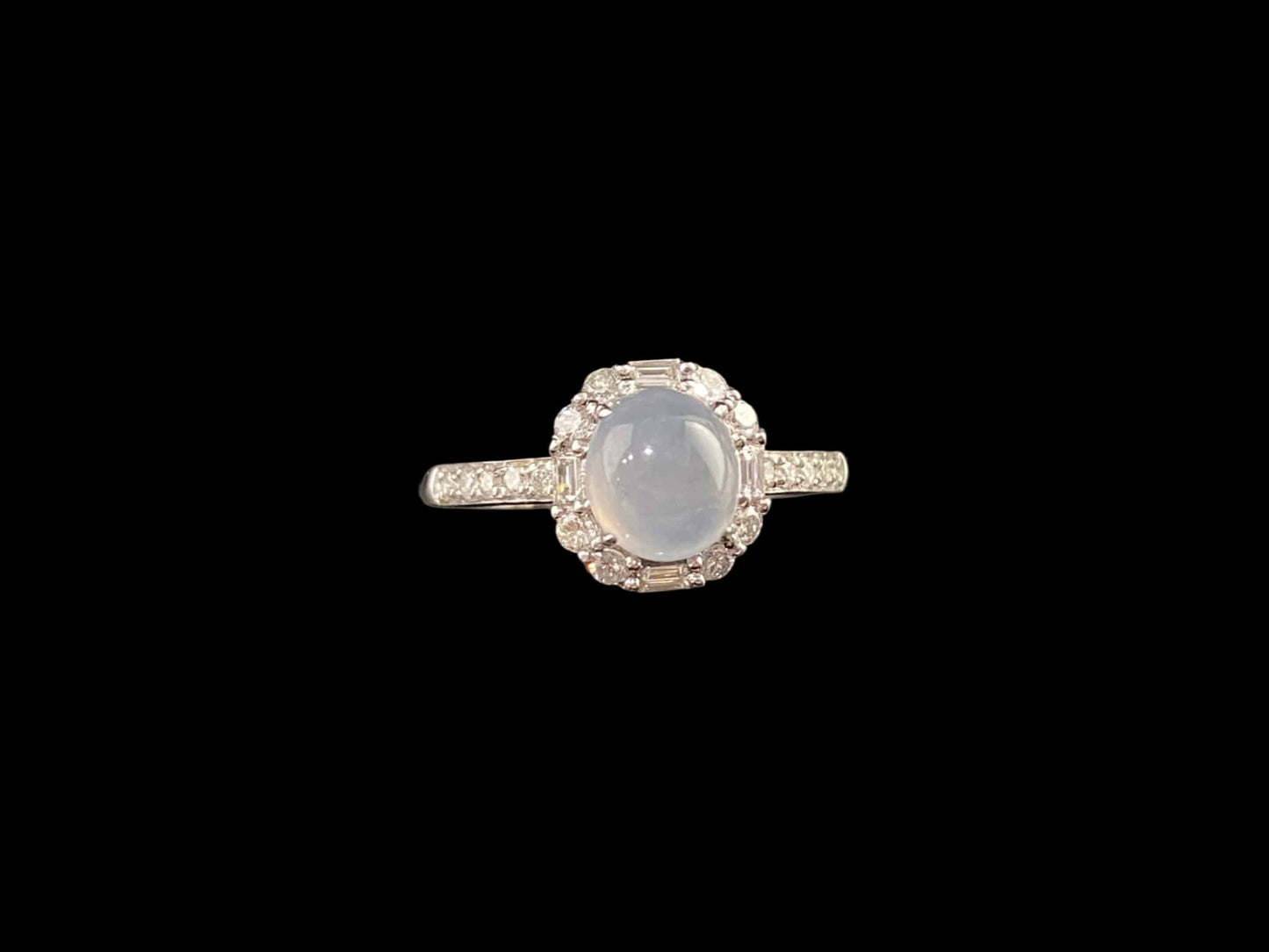 A pale dew drop jadeite ring.