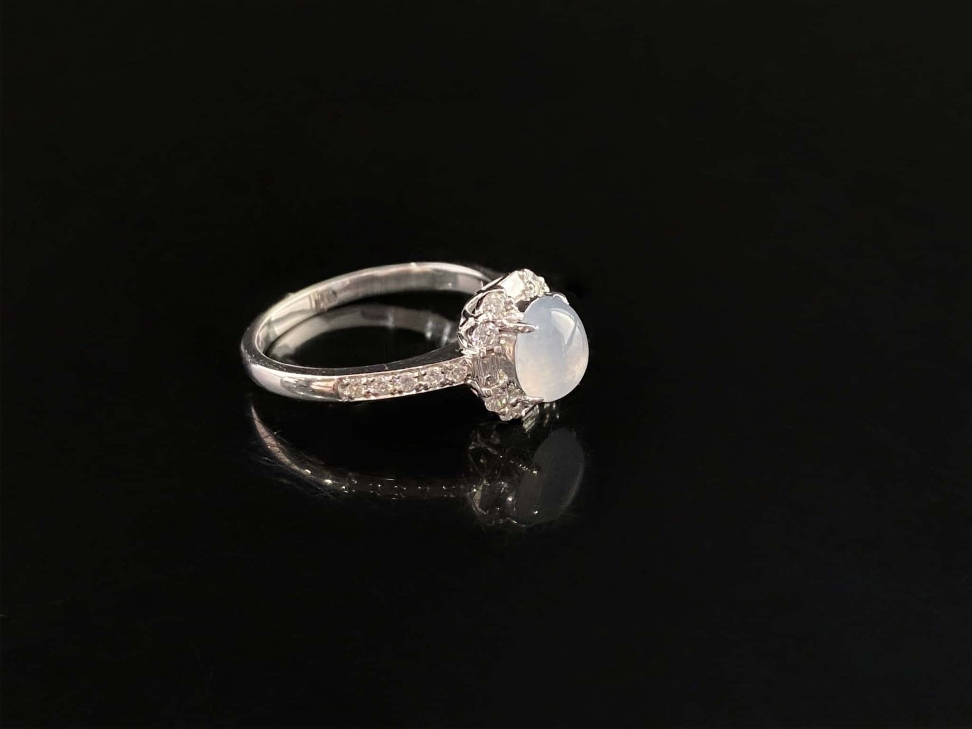 A pale dew drop jadeite ring.