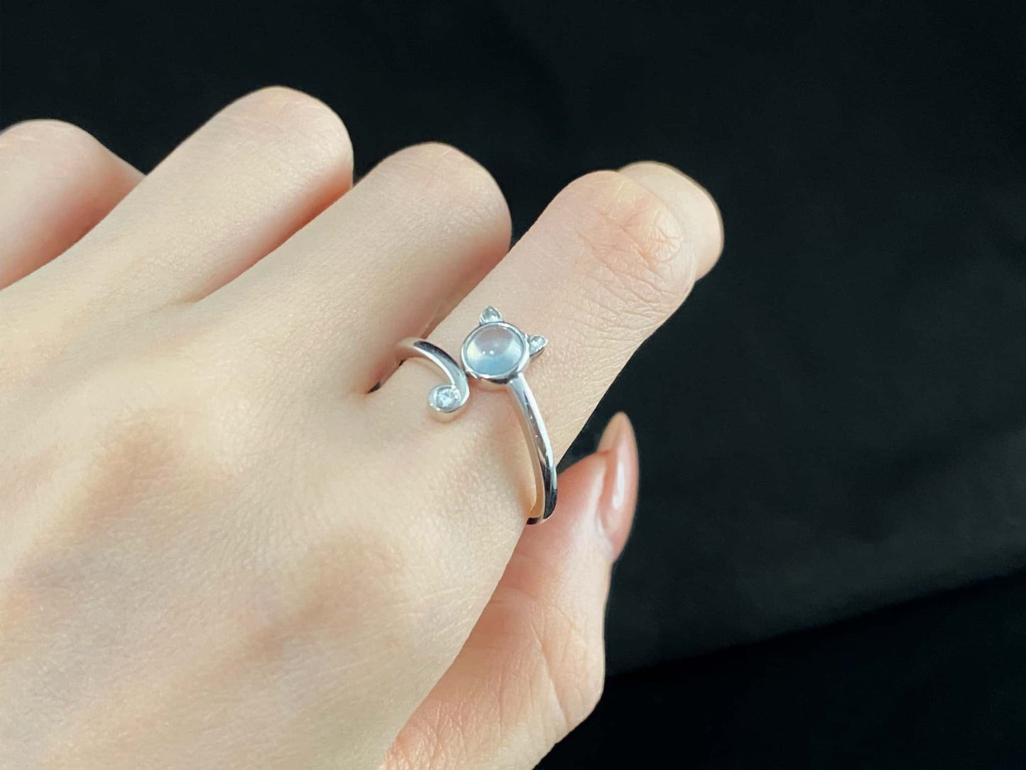 A moonlight feline jadeite ring.