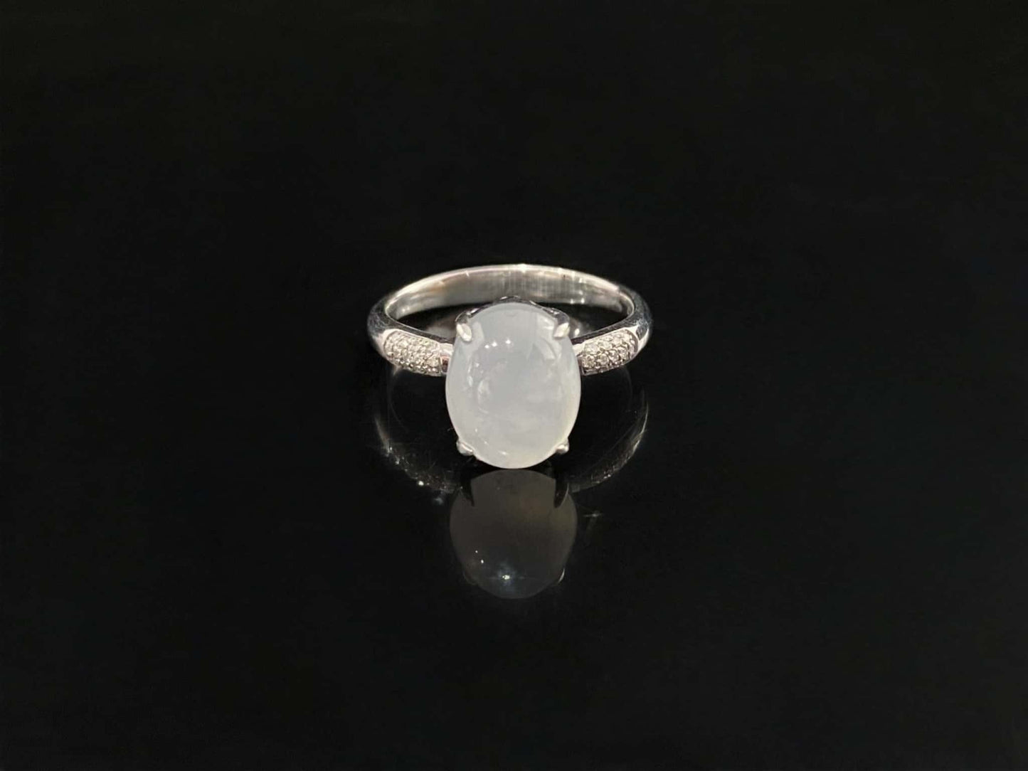 A moonlit ice cabochon jadeite ring.