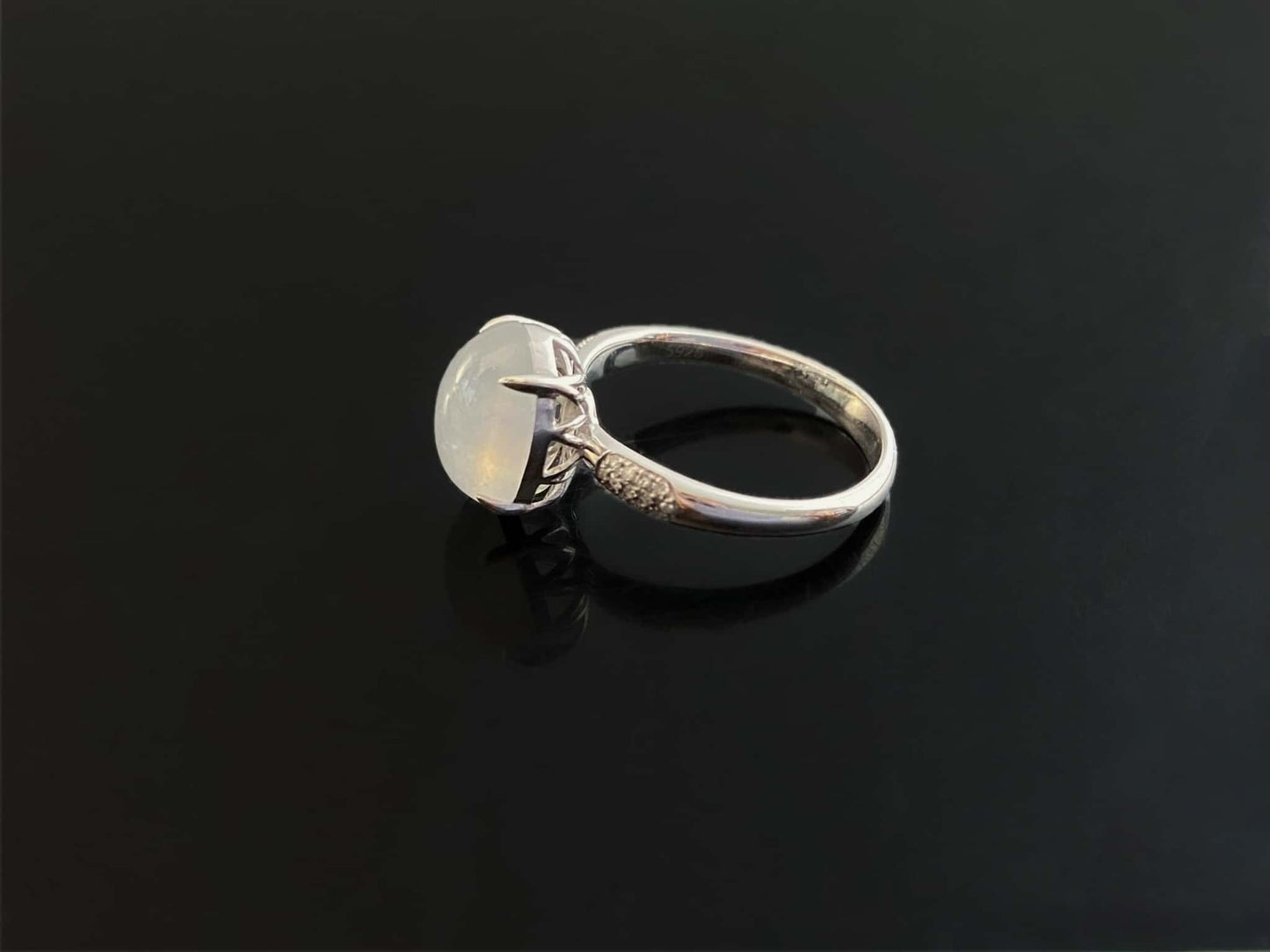 A moonlit ice cabochon jadeite ring. 