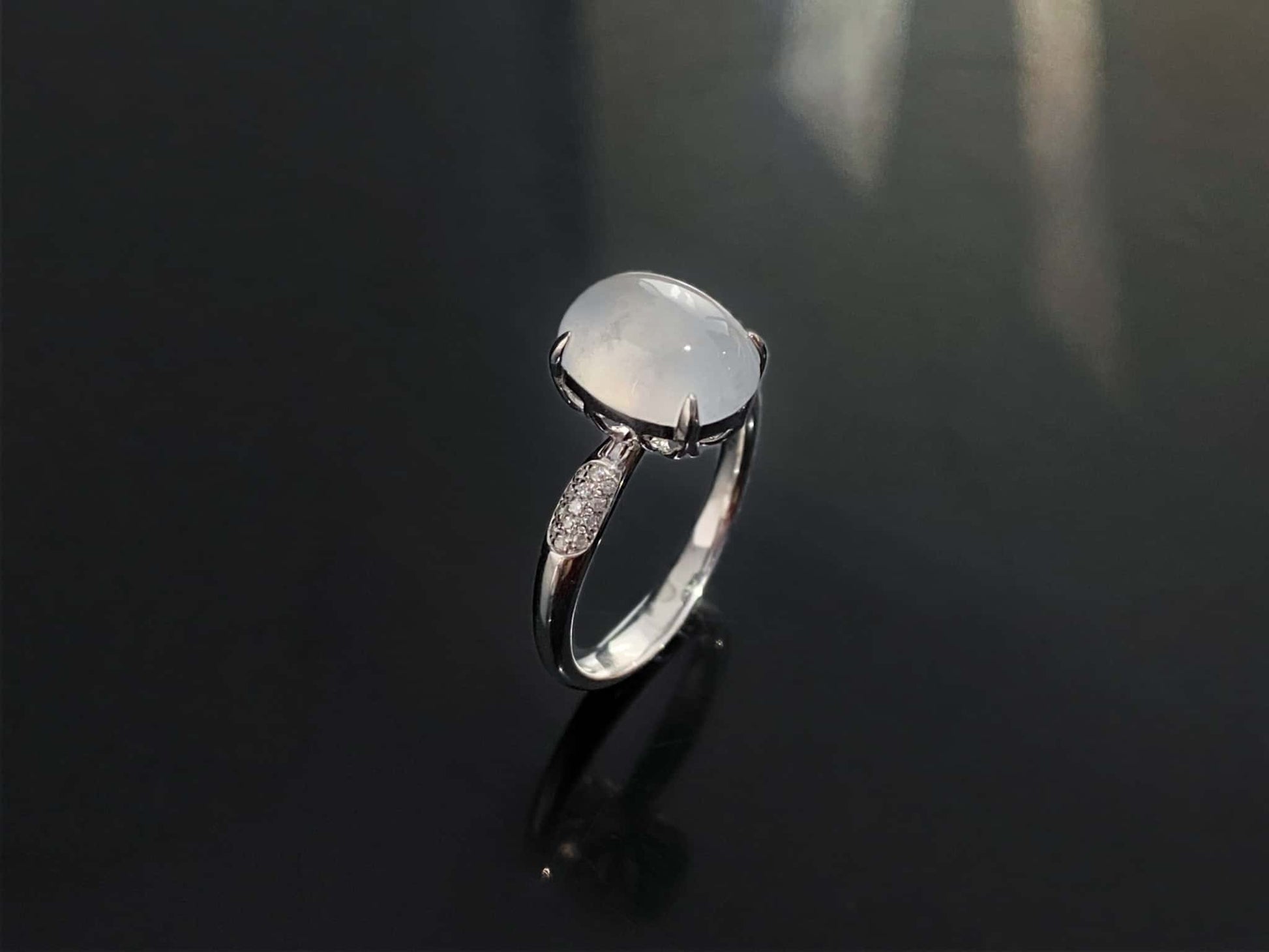 A moonlit ice cabochon jadeite ring.