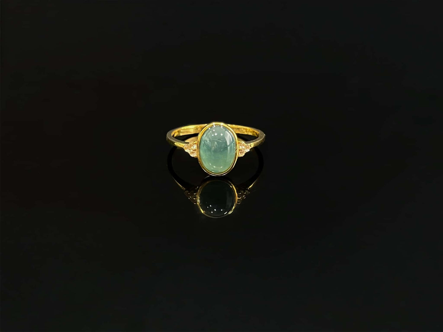 A lagoon blue-green jadeite ring.