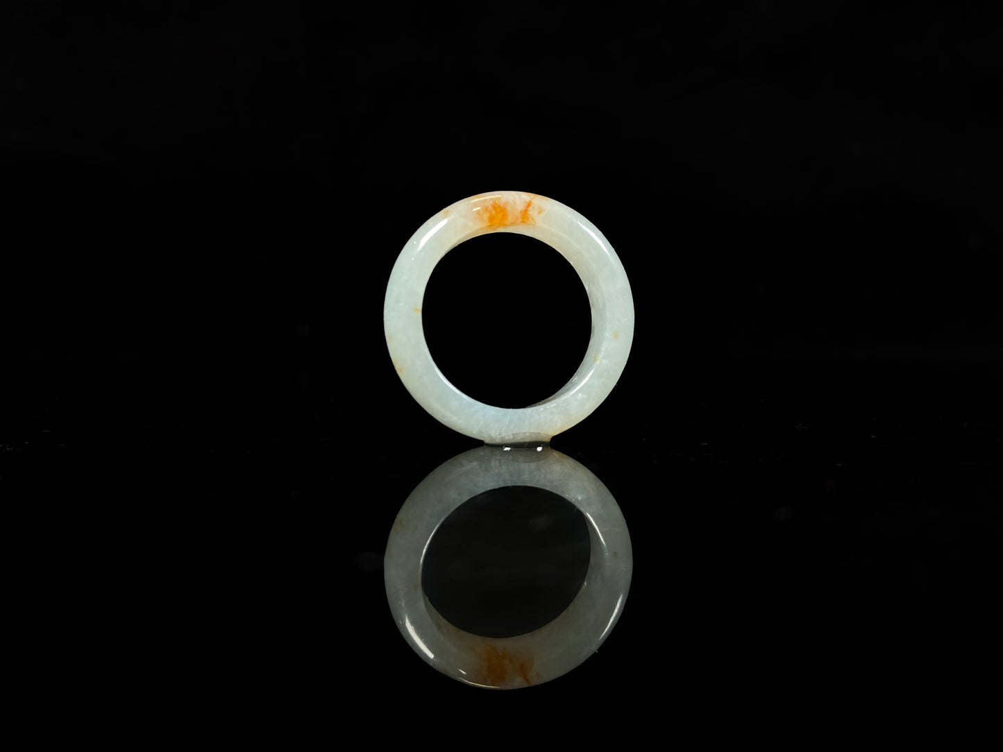 A icy white amber spark jadeite ring.