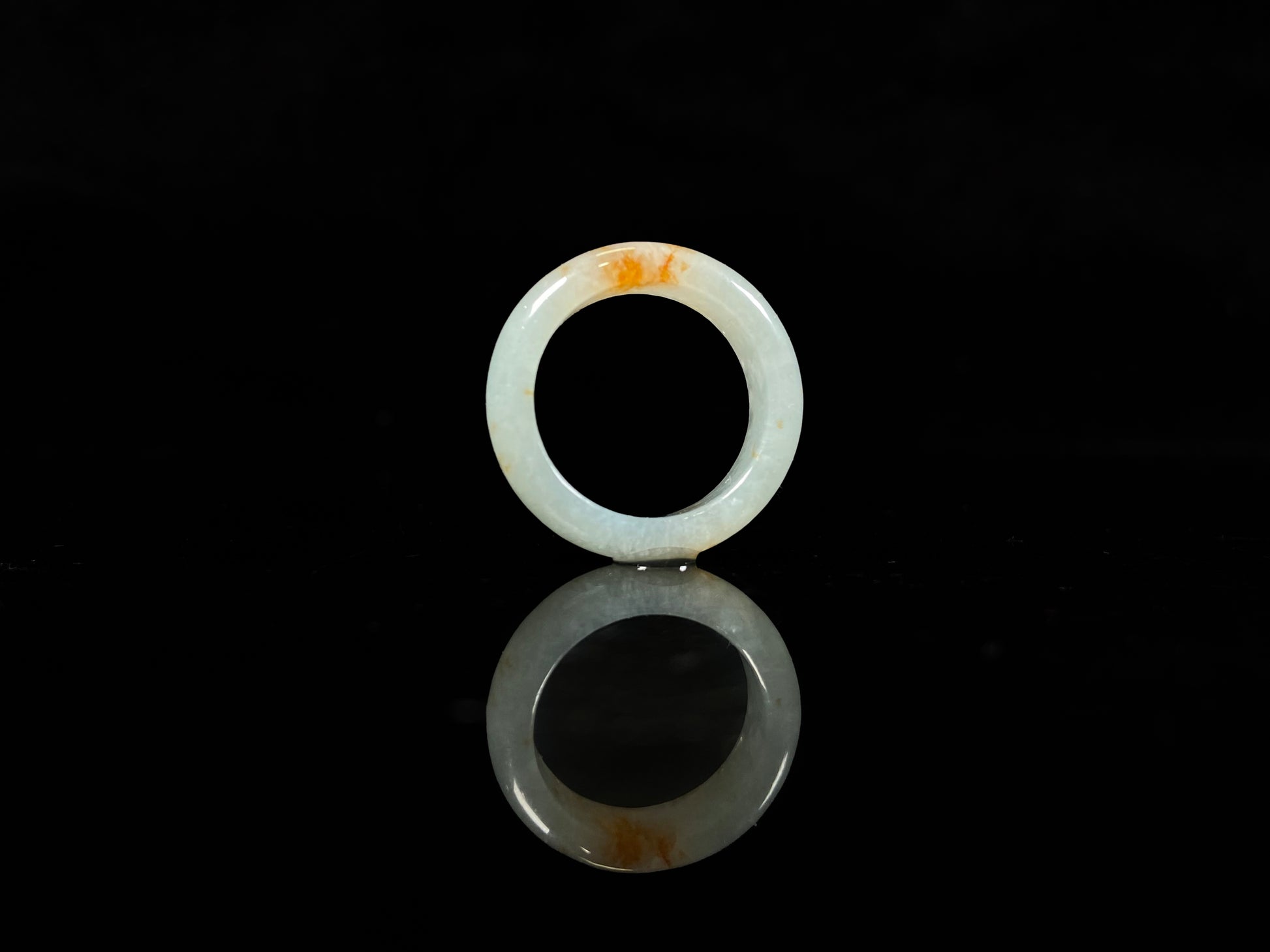 A icy white amber spark jadeite ring.
