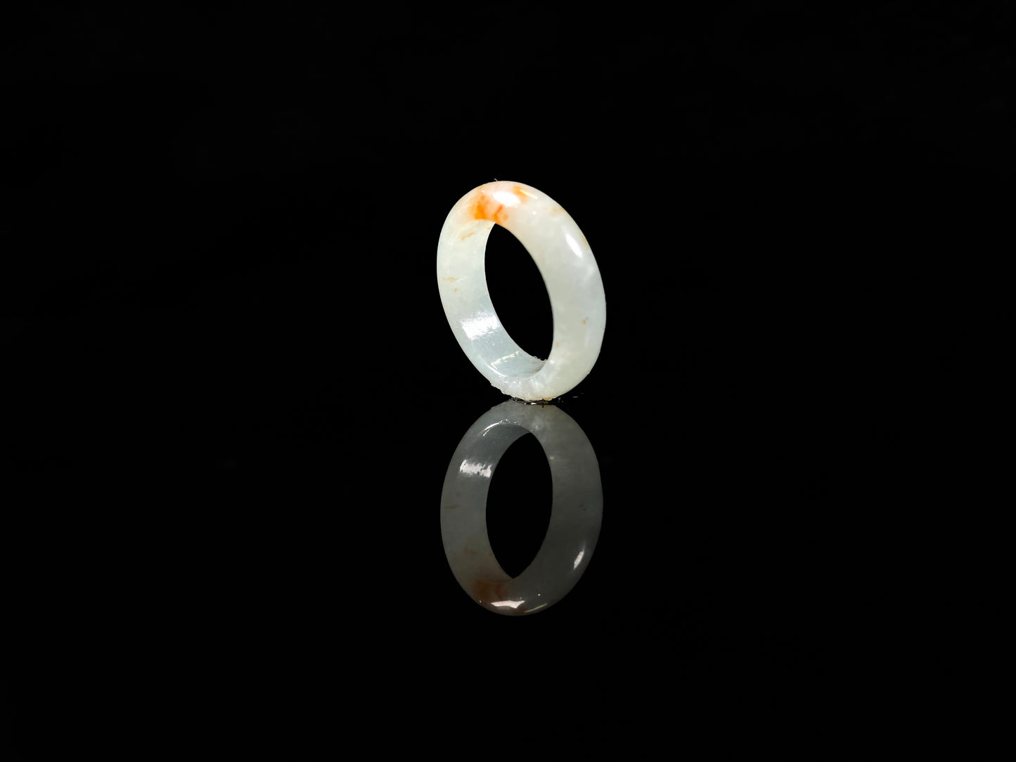 A icy white amber spark jadeite ring.