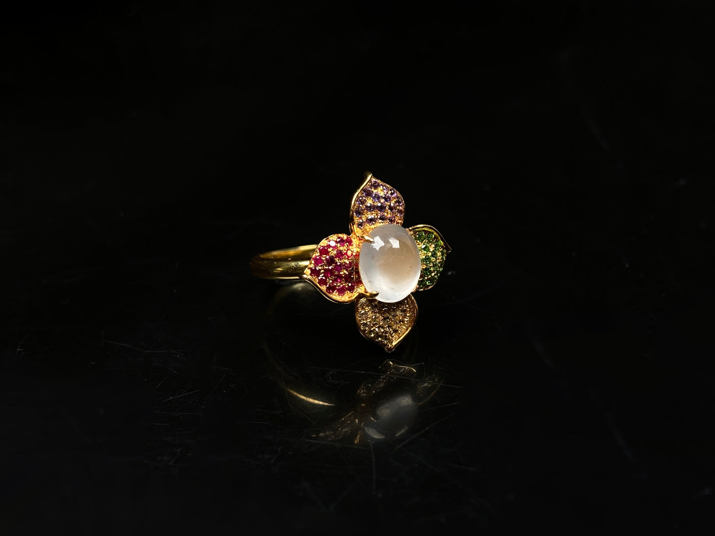 A icy white with vibrant petal jadeite ring.