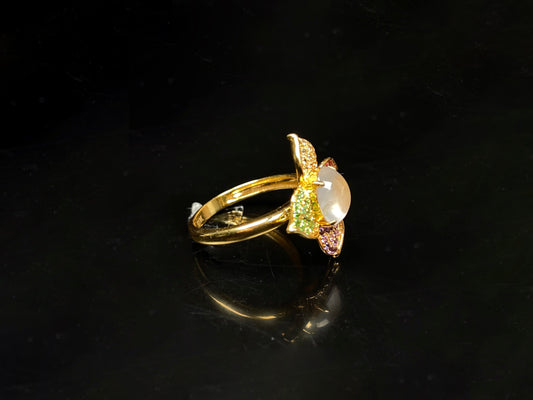 A icy white with vibrant petal jadeite ring.