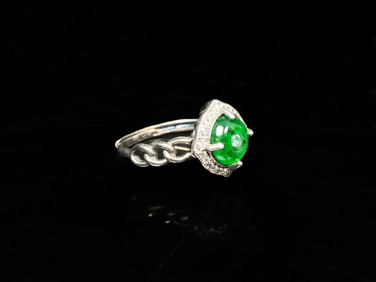 A curb chain green jadeite ring.