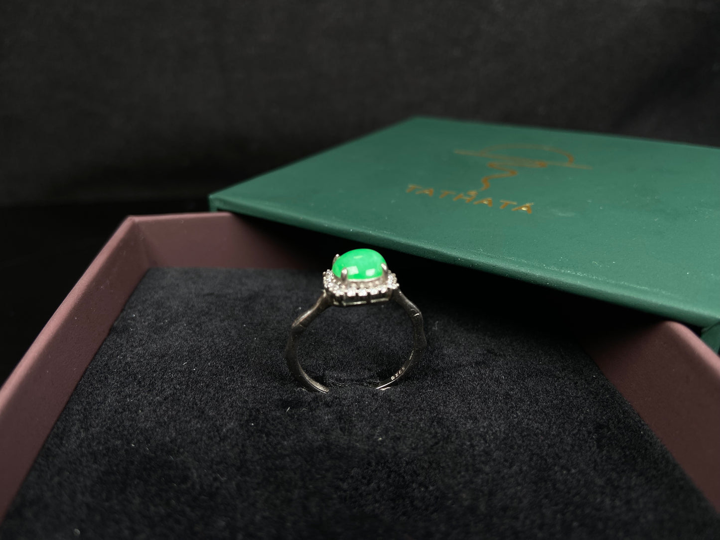 A jelly apple hue jadeite ring.
