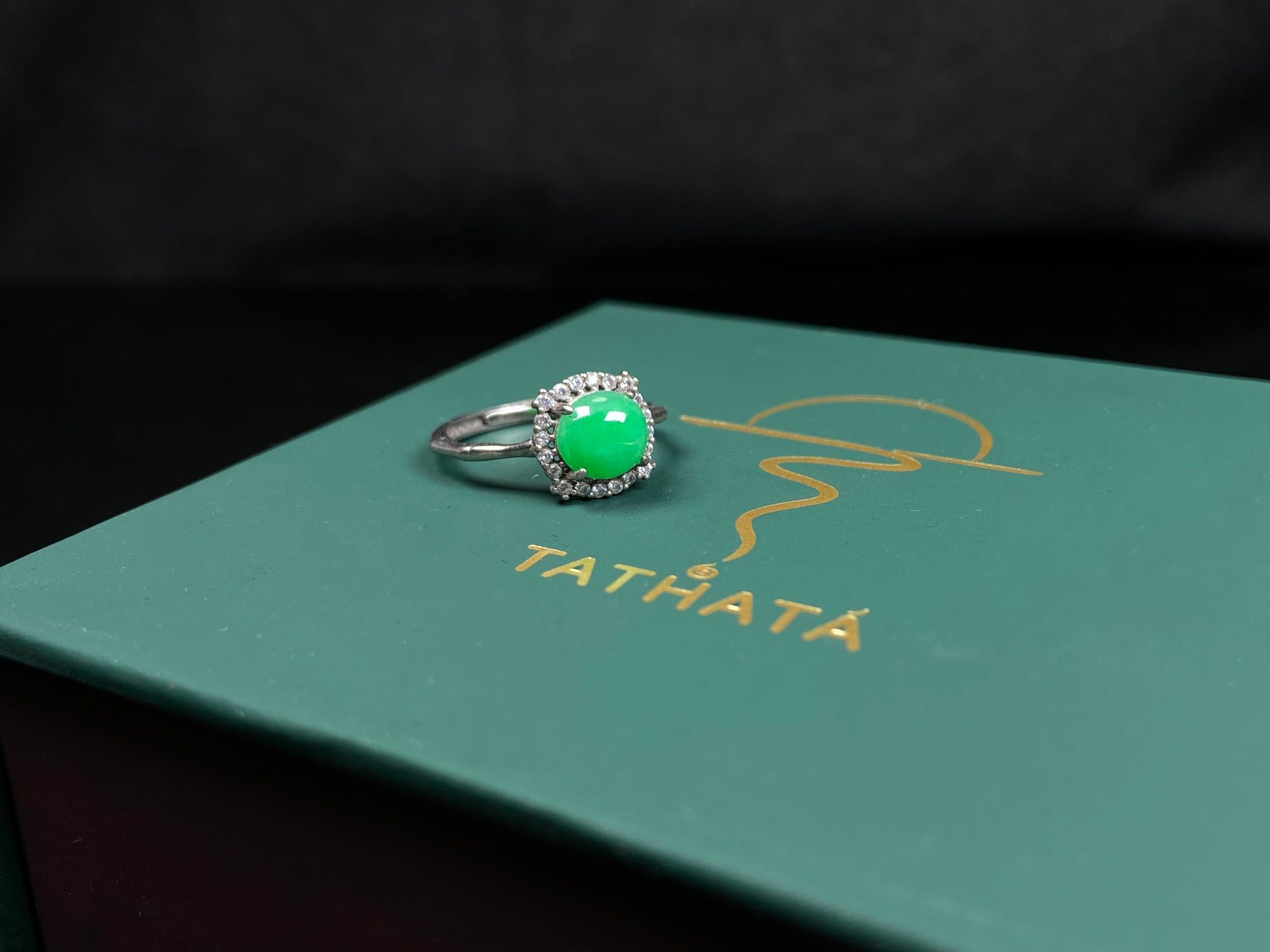 A jelly apple hue jadeite ring.