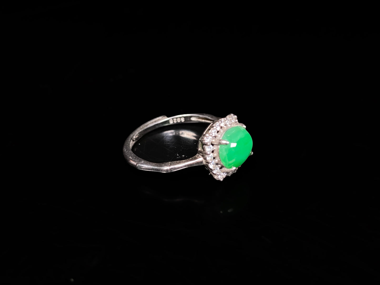 A jelly apple hue jadeite ring.