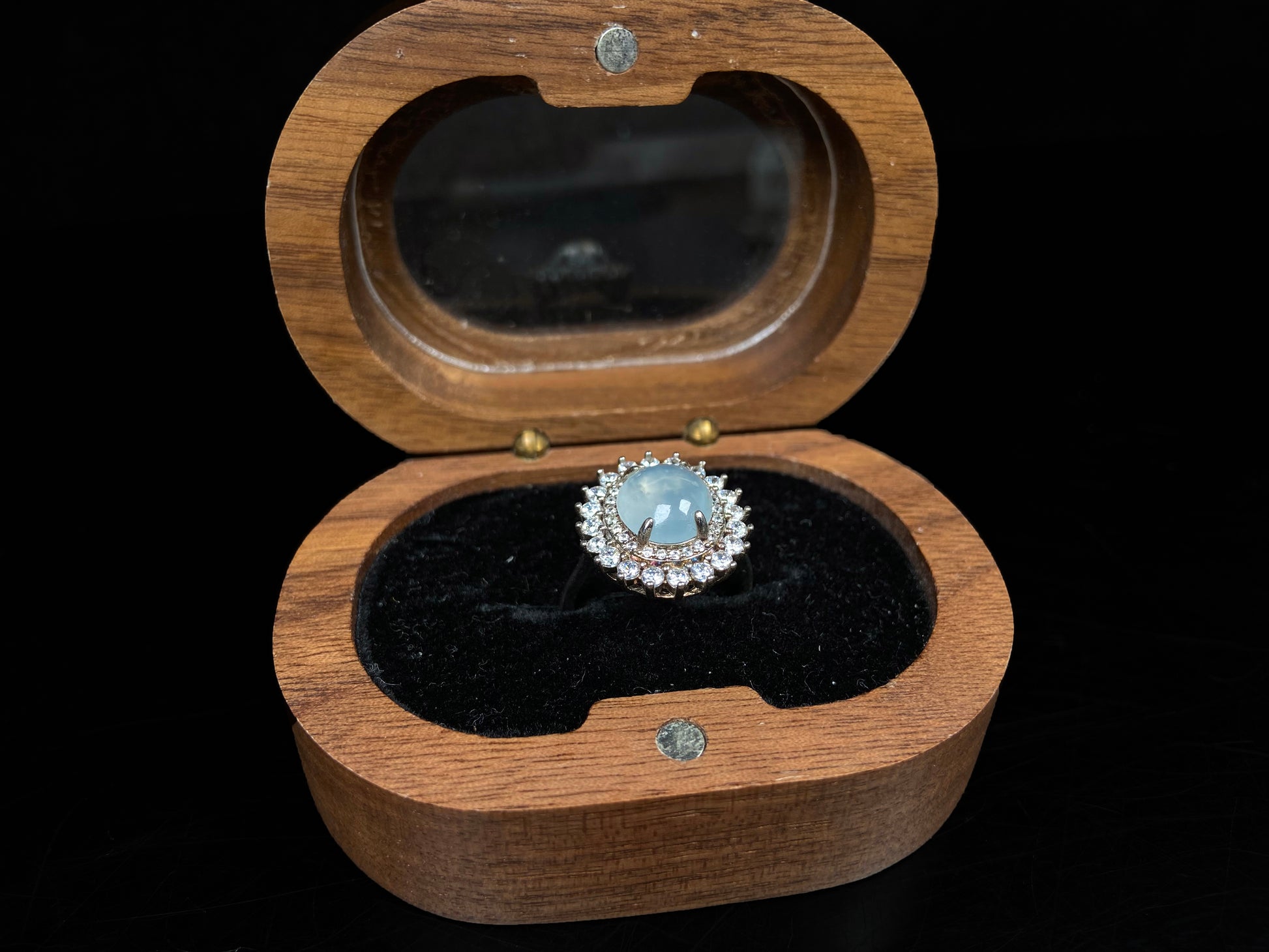 A pale blue moon glow jadeite ring.