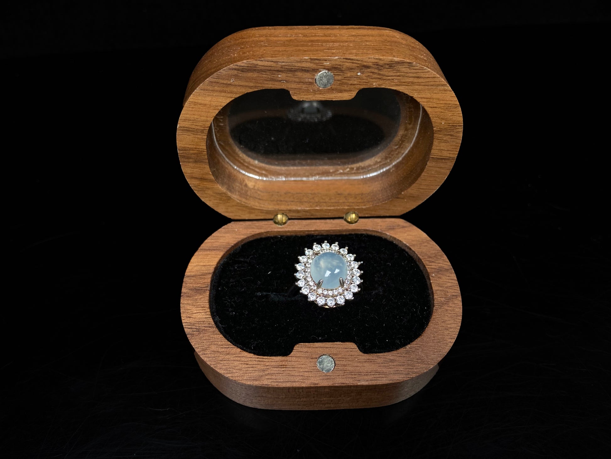 A pale blue moon glow jadeite ring.