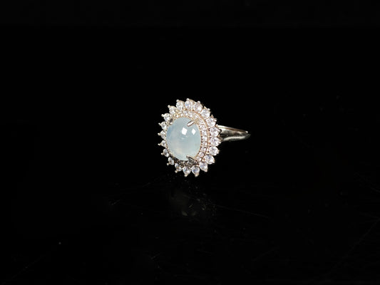 A pale blue moon glow jadeite ring.