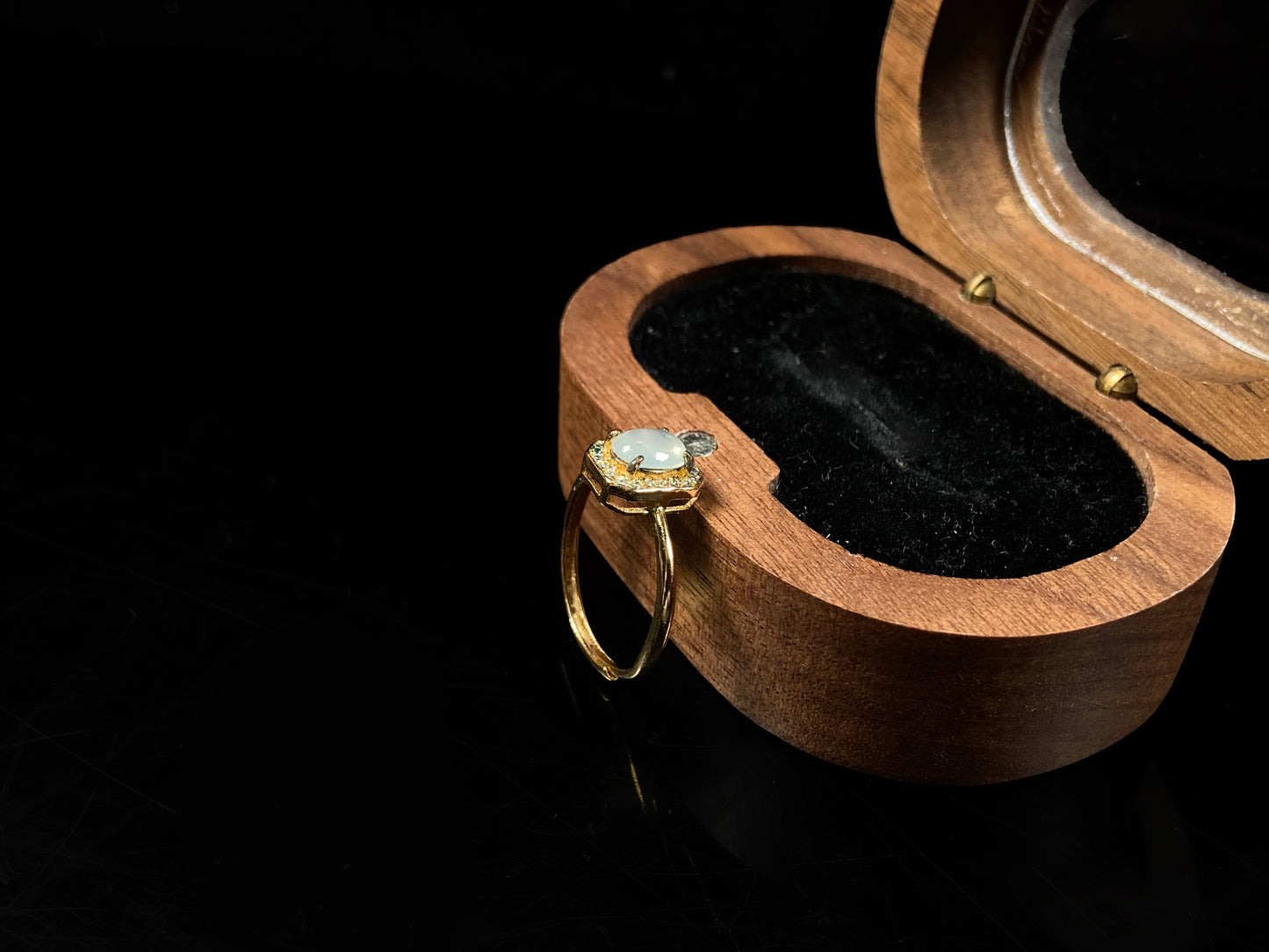 A icy moonlit bloom jadeite ring.