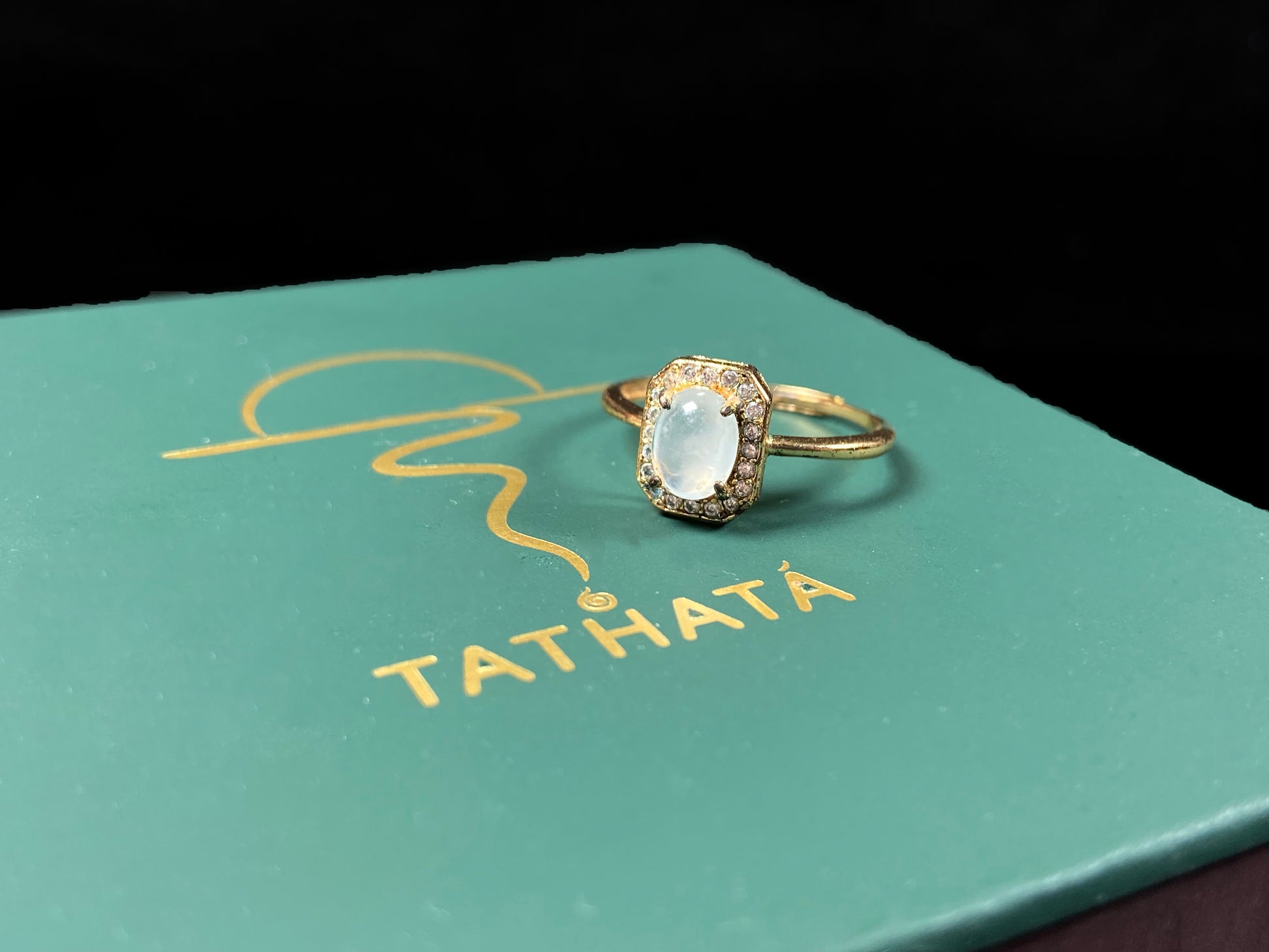 A icy moonlit bloom jadeite ring.