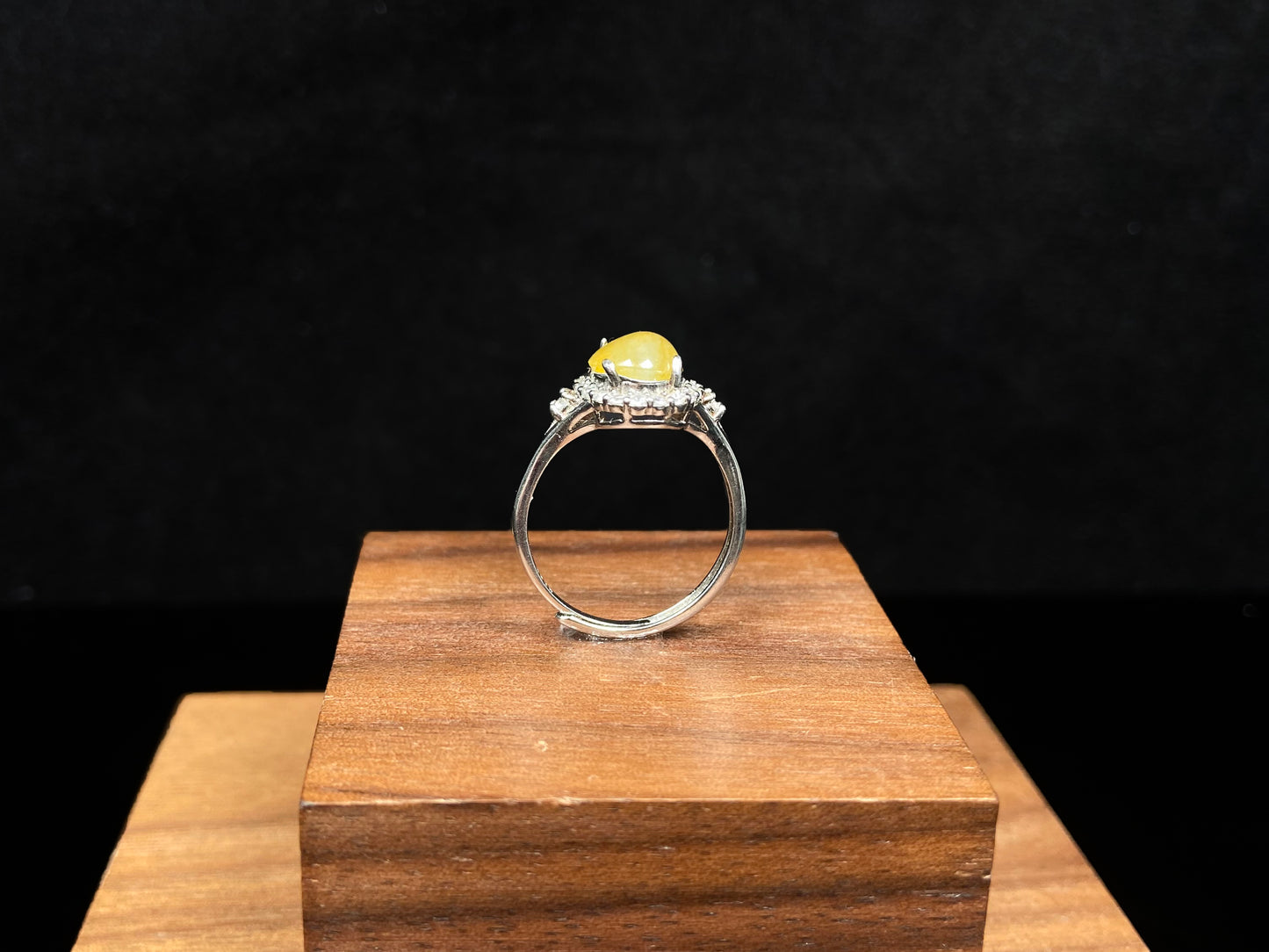 A apricot-hued jadeite bangle.