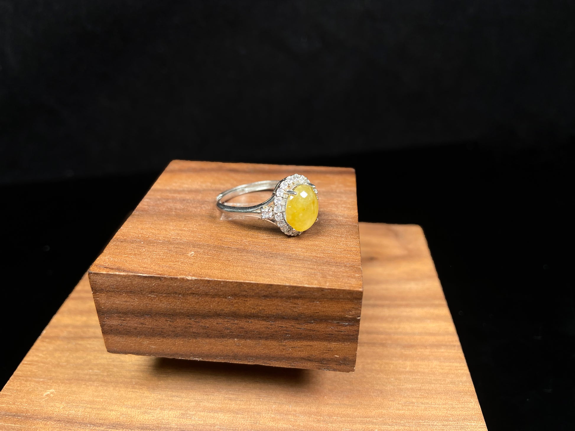 A apricot-hued jadeite bangle.