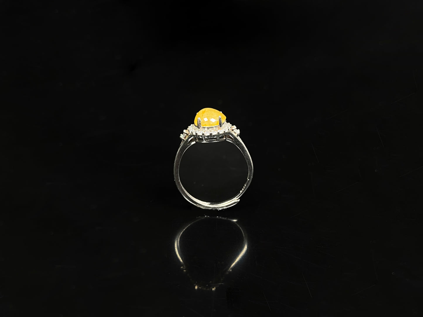 A apricot-hued jadeite bangle.
