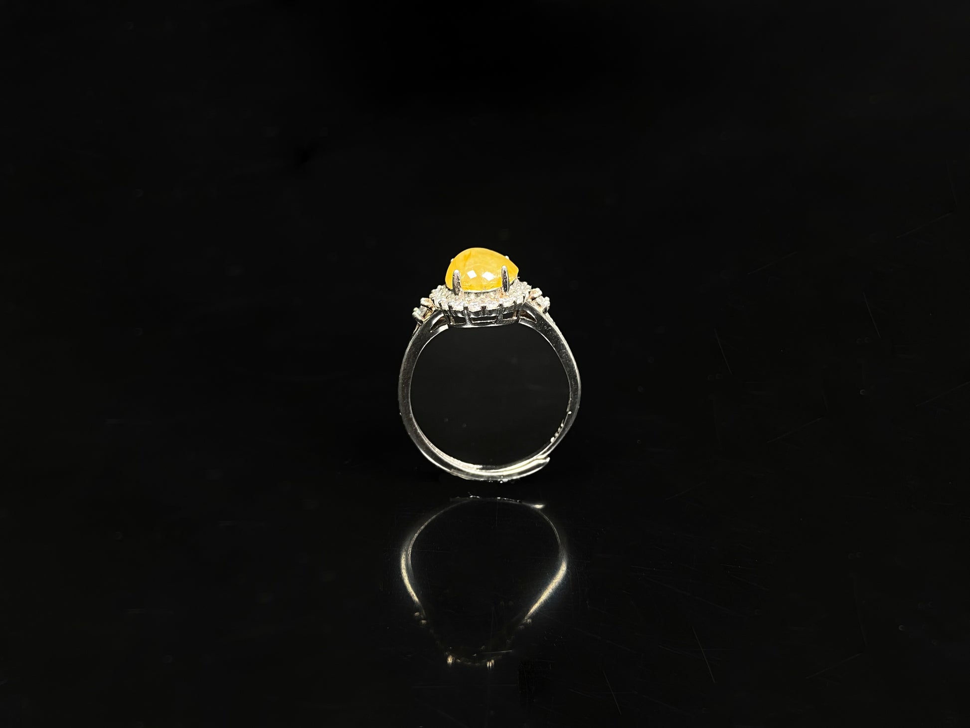 A apricot-hued jadeite bangle.