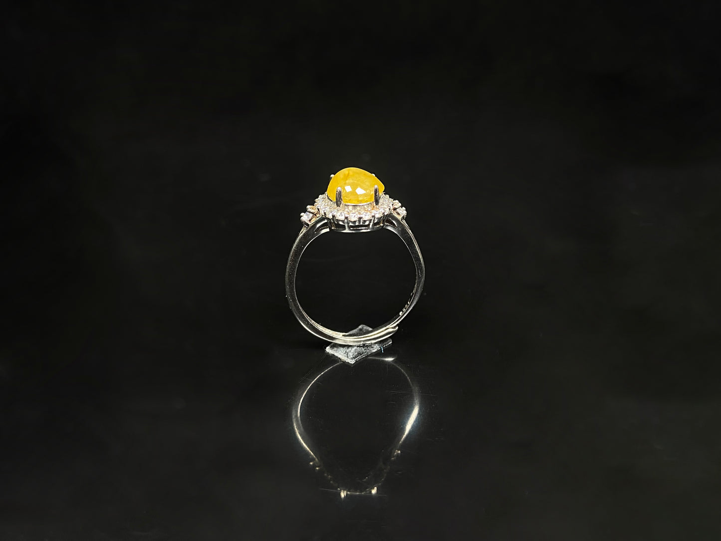 A apricot-hued jadeite bangle.