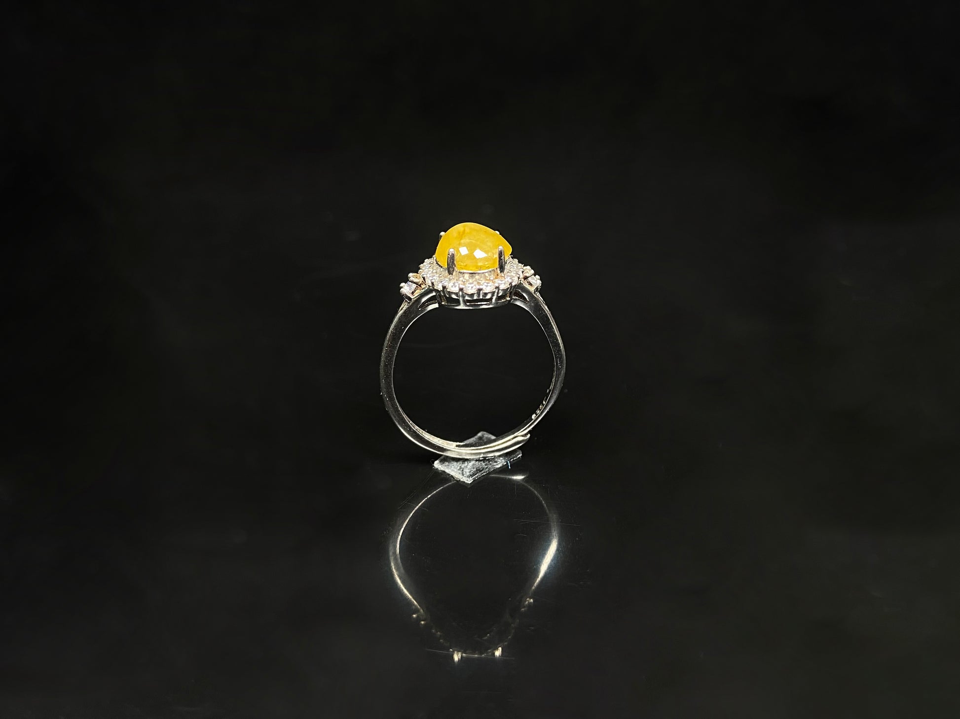 A apricot-hued jadeite bangle.