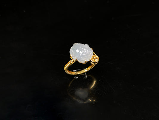 A icy white fortune Pixiu jadeite ring.