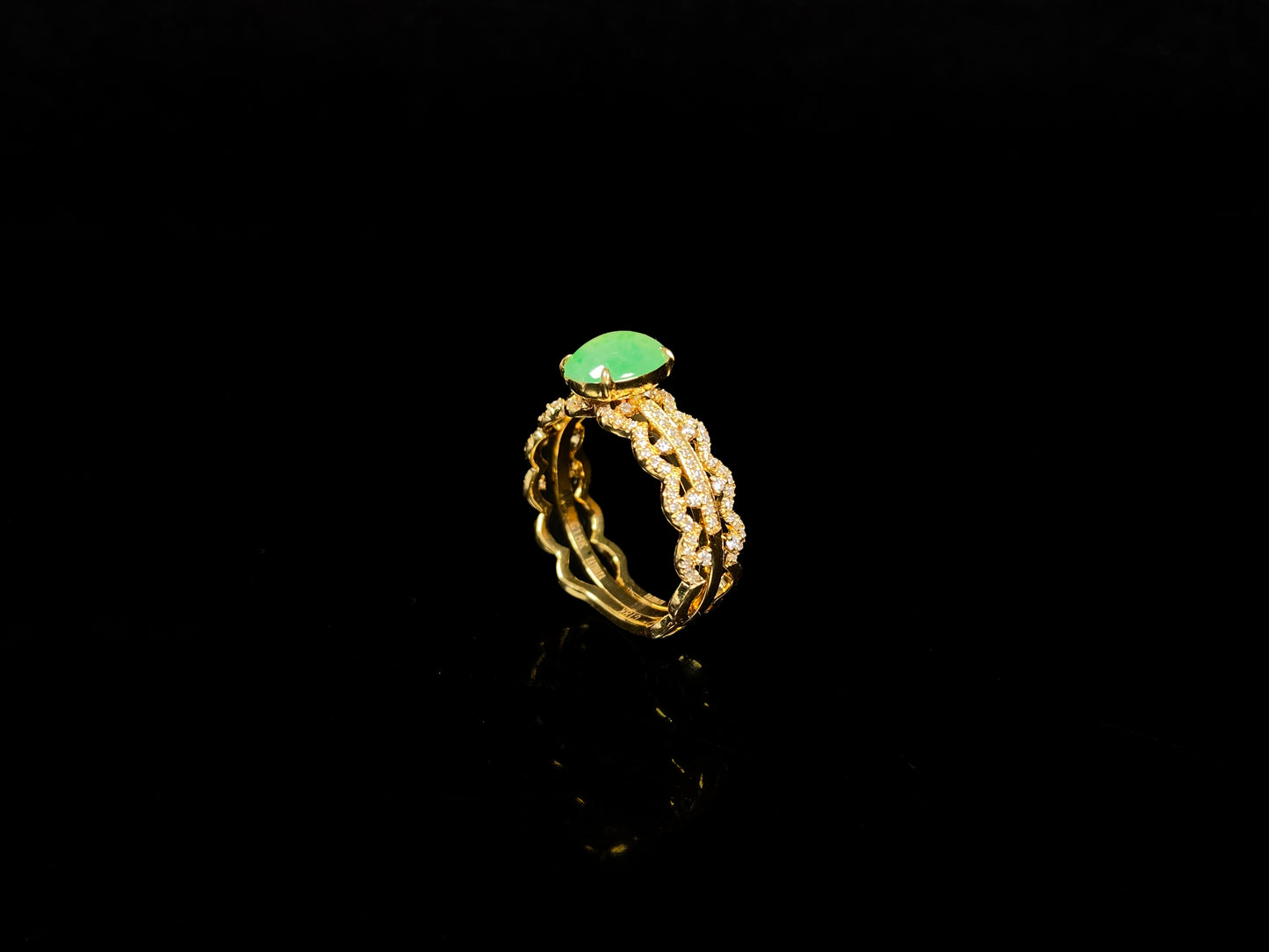 A golden wave apple hue jadeite ring.