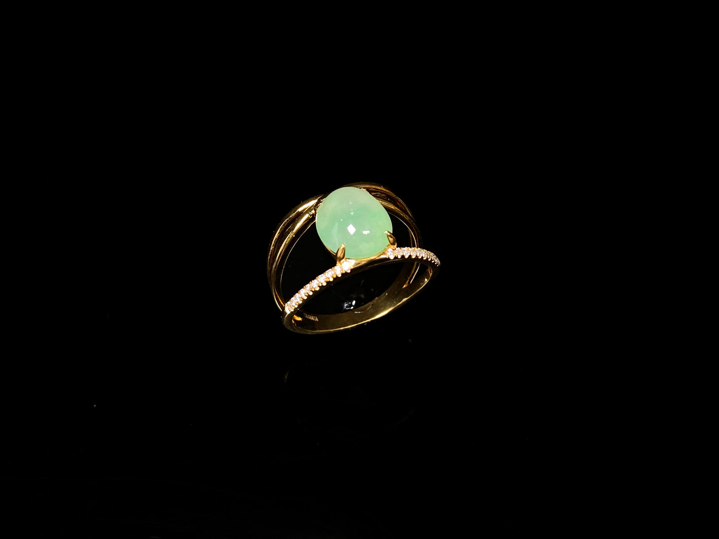 A dual line fresh green jadeite ring.