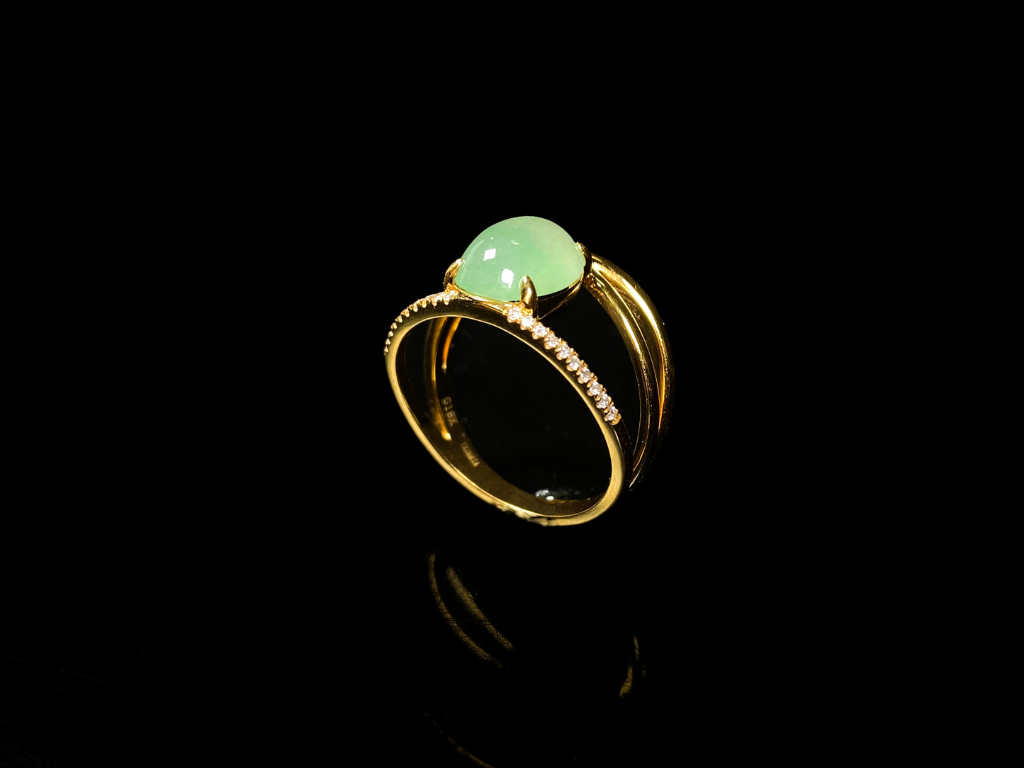 A dual line fresh green jadeite ring.