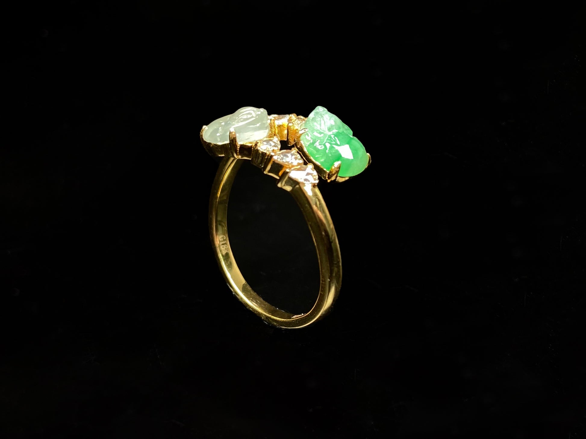 A icy white green twin Pixiu jadeite ring.