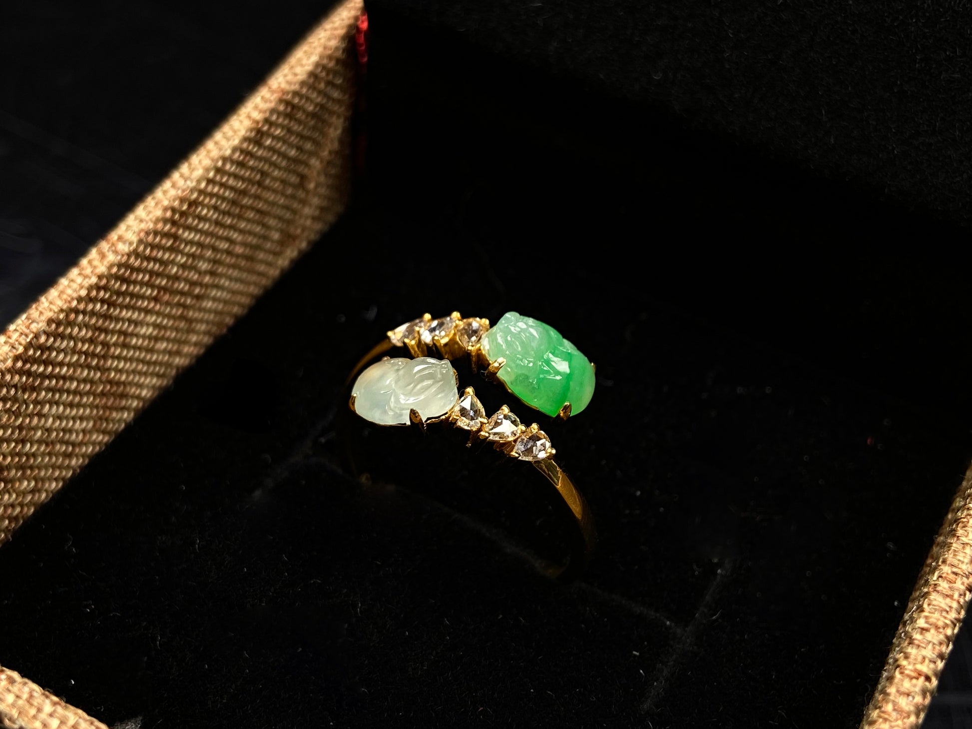 A icy white green twin Pixiu jadeite ring.