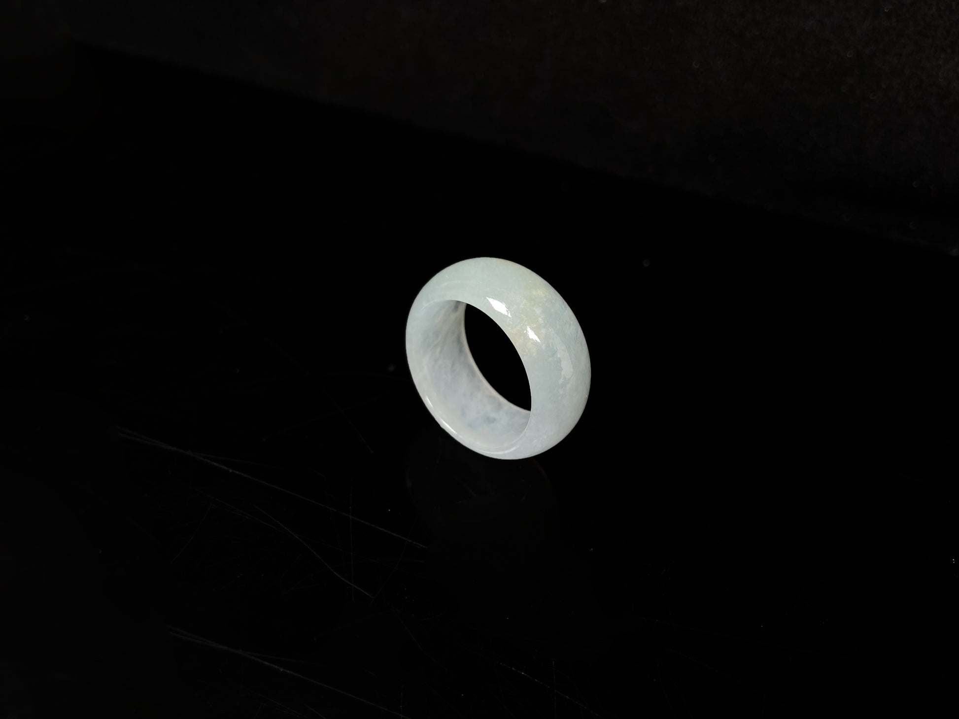 A pale celadon with a hint of yellow  jadeite ring.