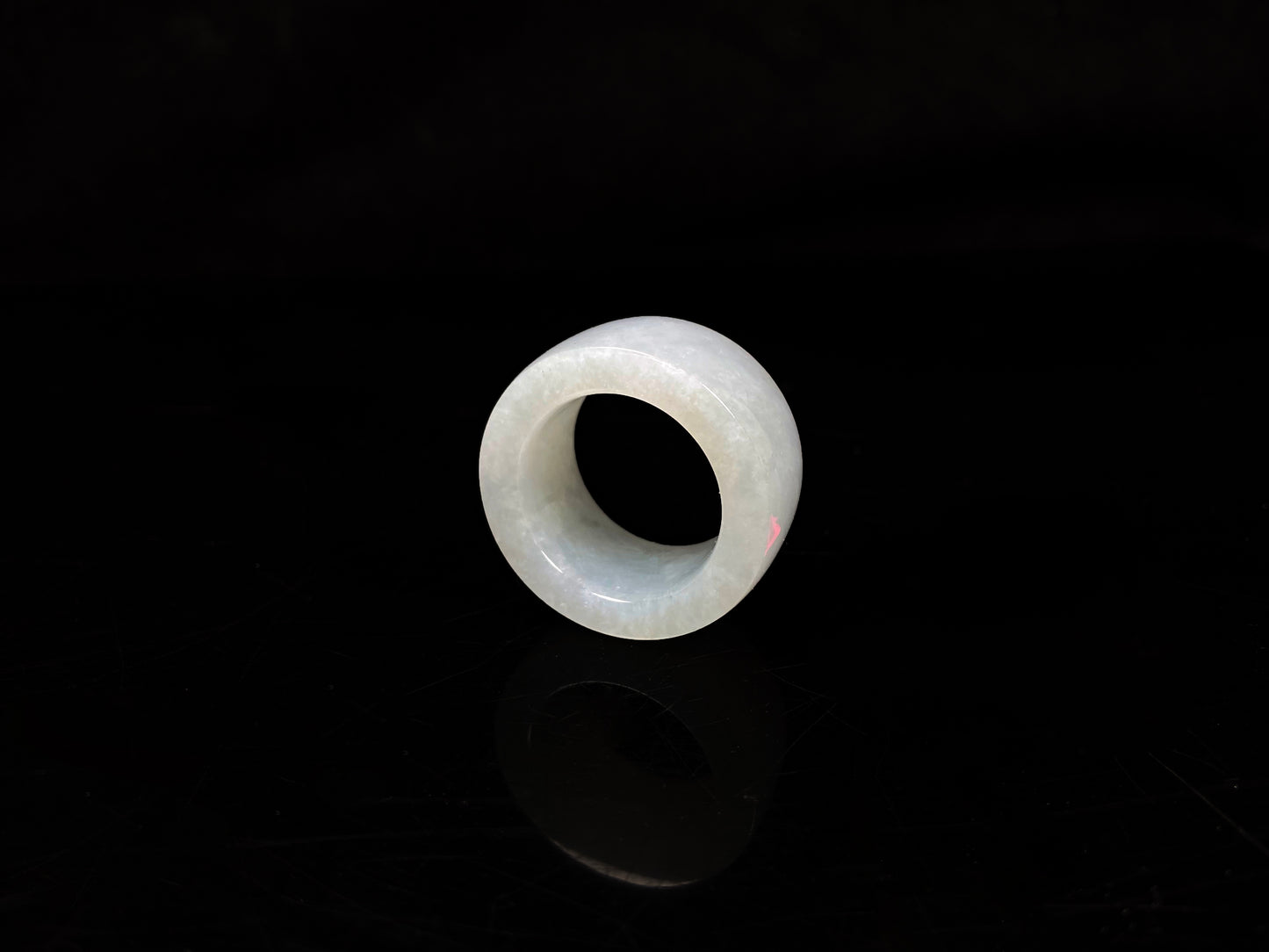 A creamy milky white thumb ring jadeite ring.