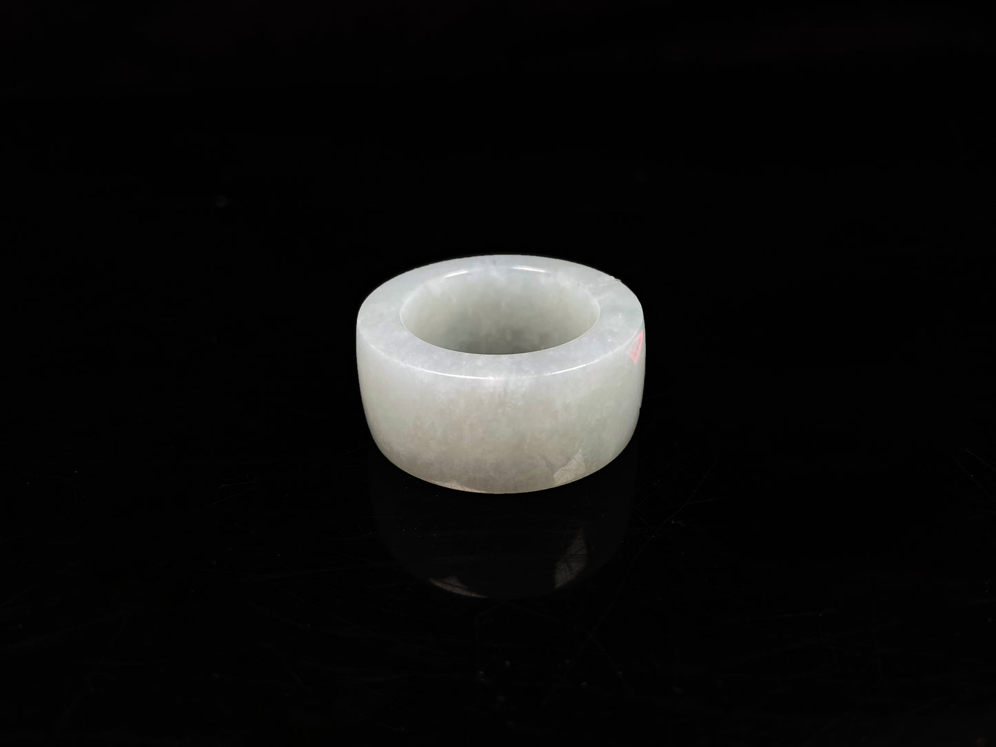 A creamy milky white thumb ring jadeite ring.