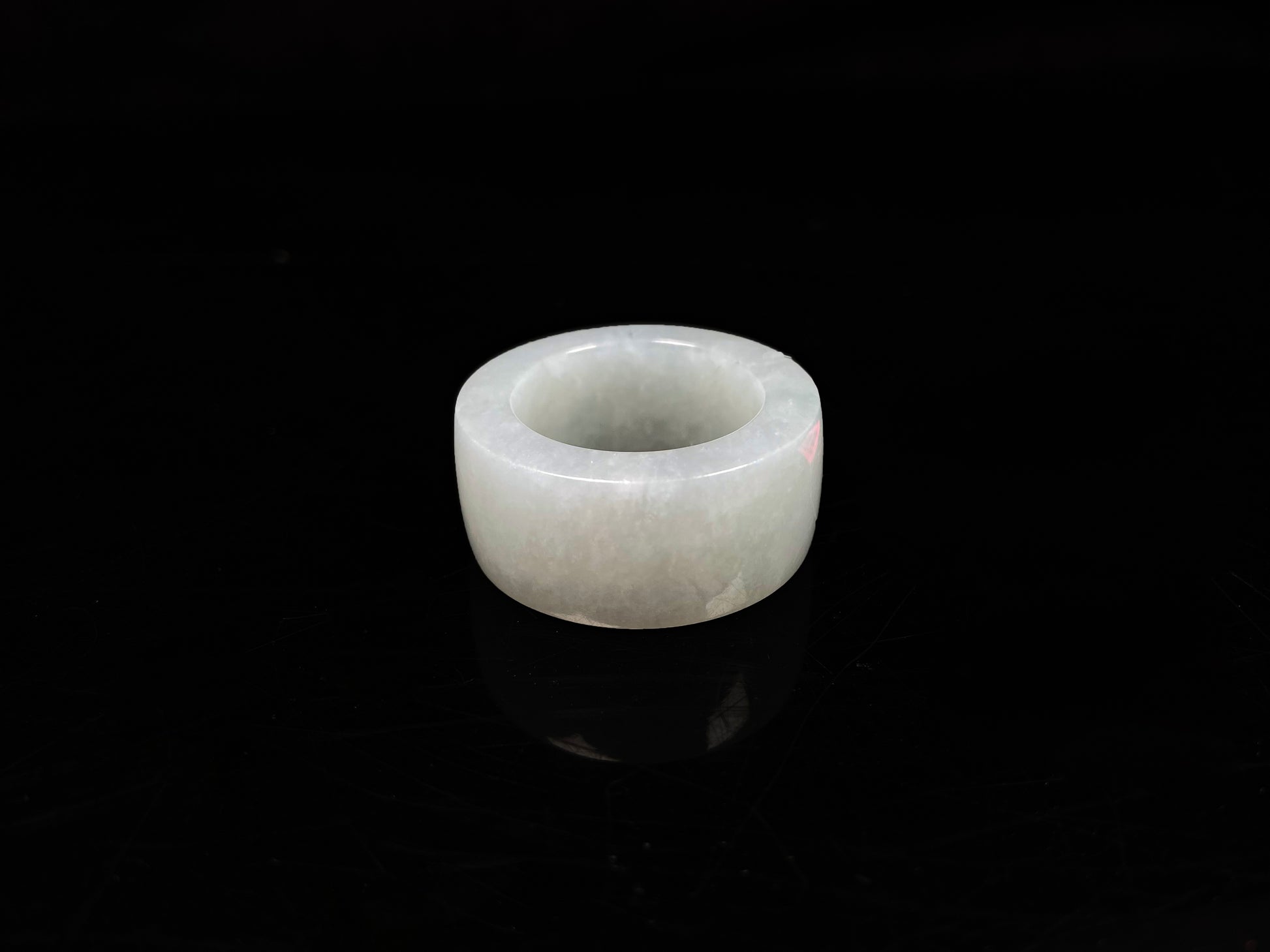 A creamy milky white thumb ring jadeite ring.