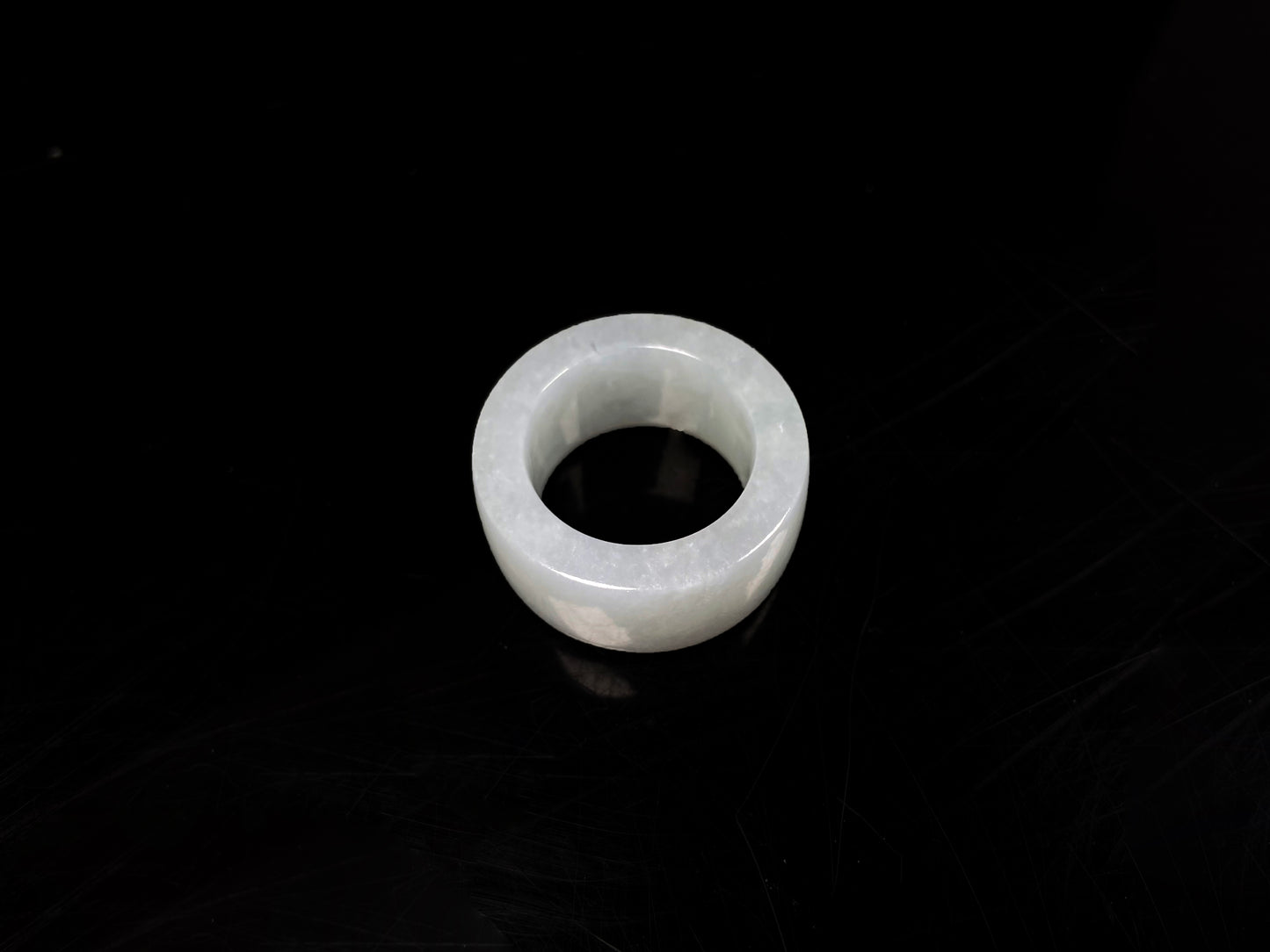 A creamy milky white thumb ring jadeite ring.