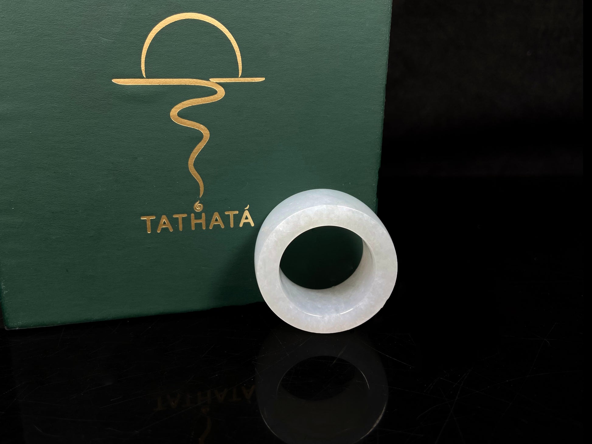 A creamy milky white thumb ring jadeite ring.