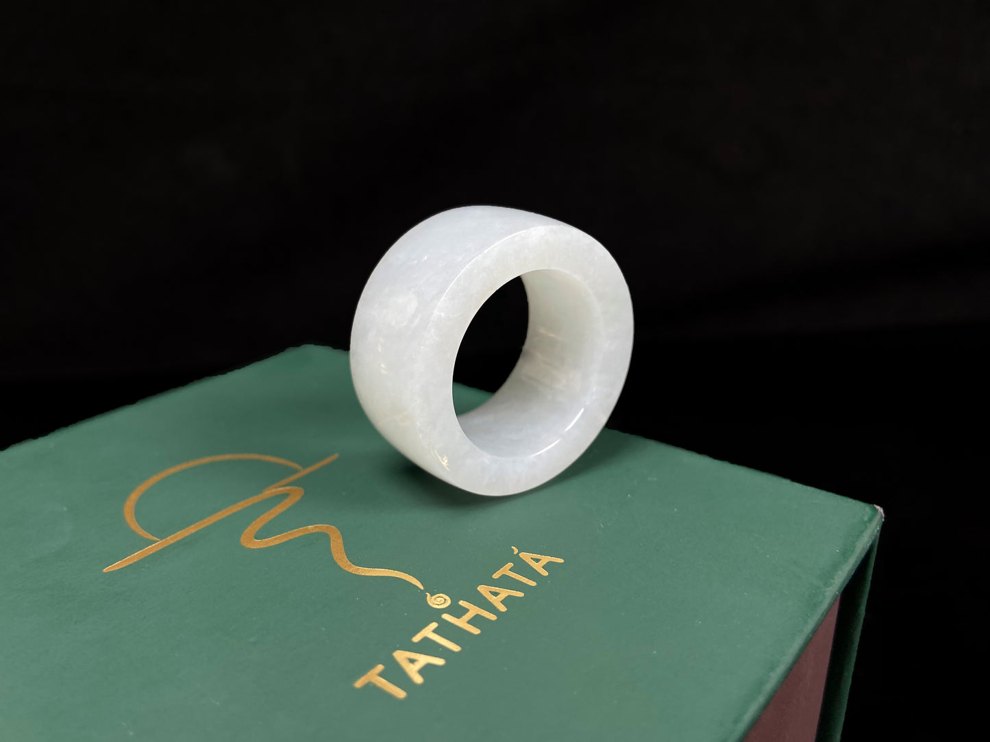 A creamy milky white thumb ring jadeite ring.