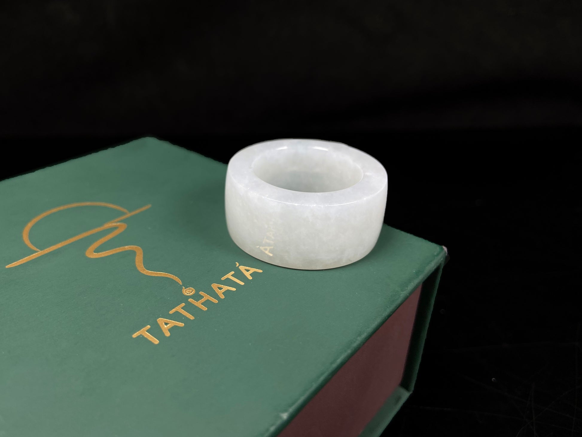 A creamy milky white thumb ring jadeite ring.