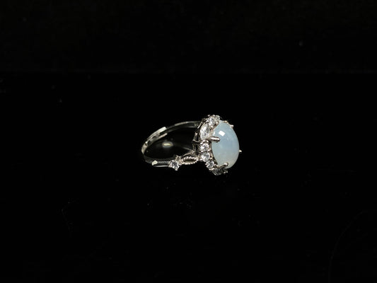 A pale white luminous translucence jadeite ring.