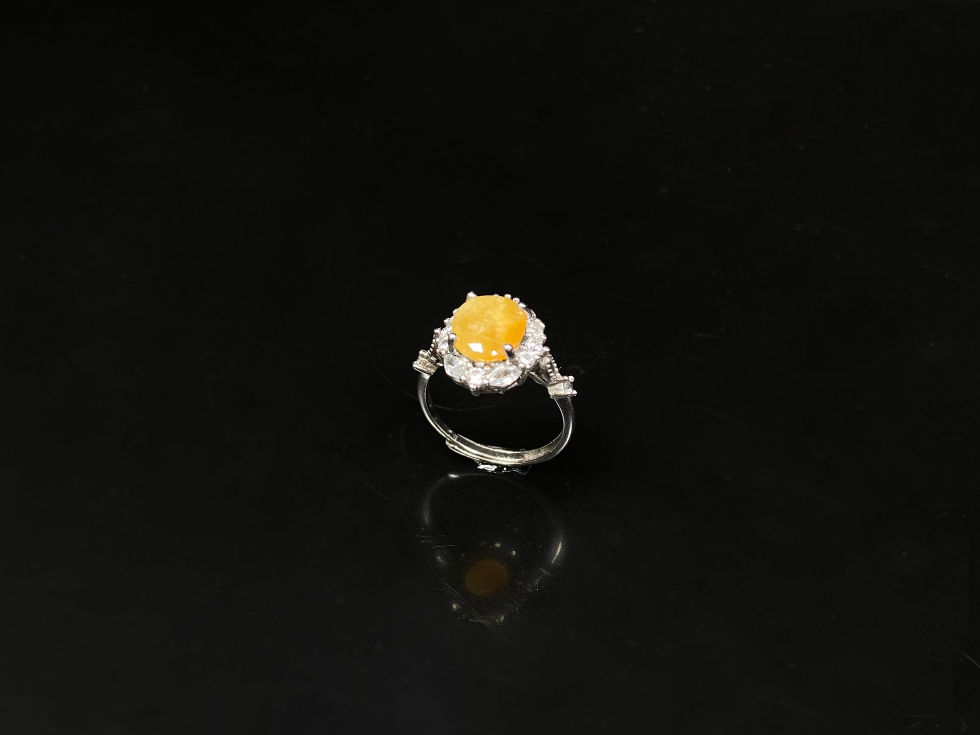 A honeyed hush glow jadeite ring.