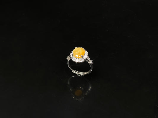 A honeyed hush glow jadeite ring.