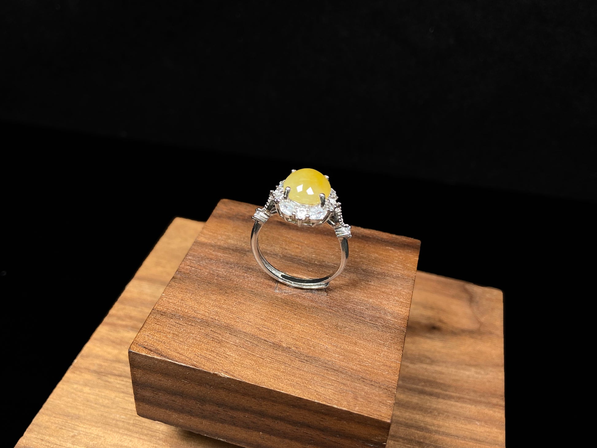 A ambered primrose gleam jadeite ring.