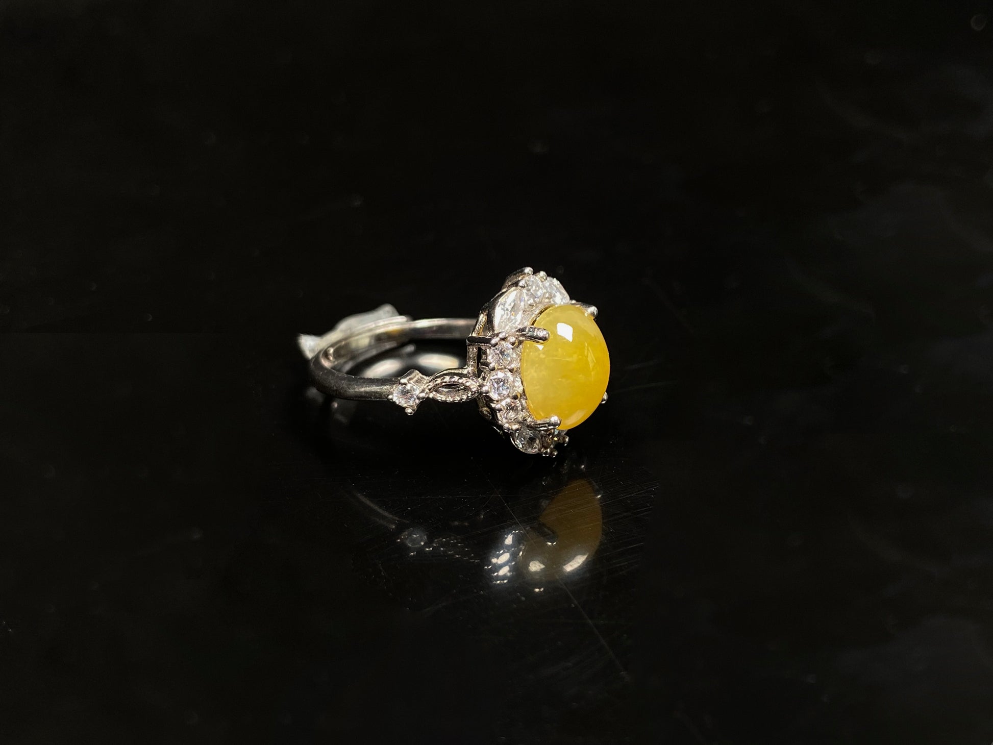 A ambered primrose gleam jadeite ring.